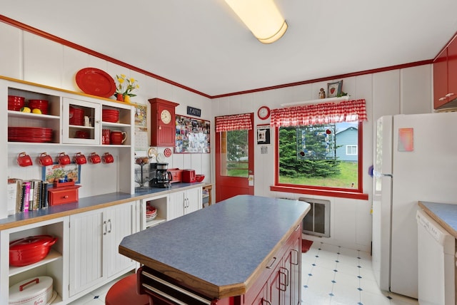 46273 Larson Beach Rd, Loon Lake, WA 99148 - kitchen with white appliances, open shelves, a kitchen island, light floors, and ornamental molding