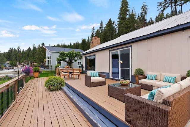 46273 Larson Beach Rd, Loon Lake, WA 99148 - deck featuring an outdoor living space and outdoor dining space