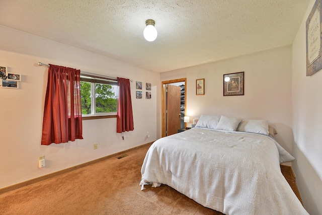 5024 E Ballard Rd, Colbert, WA 99005 - bedroom featuring carpet floors and a textured ceiling