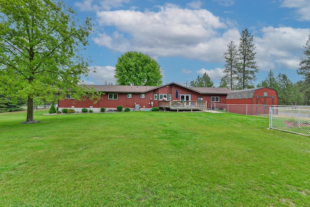5024 E Ballard Rd, Colbert, WA 99005 - back of house with a barn, an outdoor structure, and a wooden deck