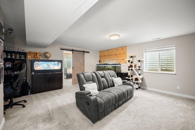 1516 E First Ct, Deer Park, WA 99006 - living area featuring a barn door, carpet flooring, an office area, and plenty of natural light