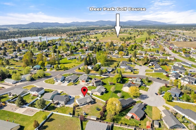 1516 E First Ct, Deer Park, WA 99006 - aerial perspective of suburban area featuring a water and mountain view
