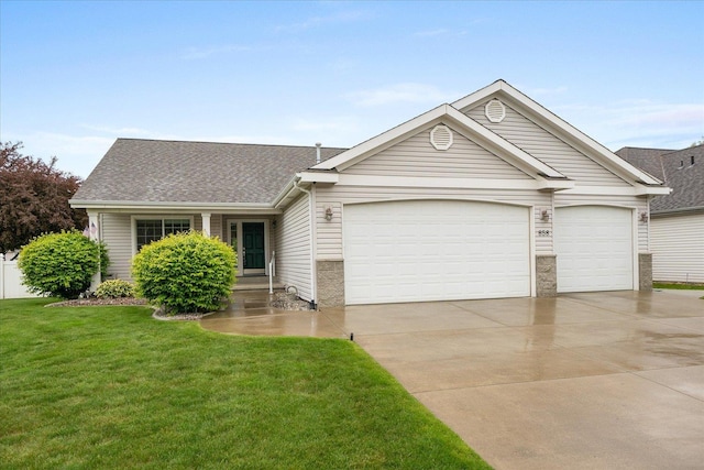 858 S Shelley Lake Ln, Spokane Valley, WA 99037 - view of front facade featuring concrete driveway, an attached garage, a front lawn, and a shingled roof