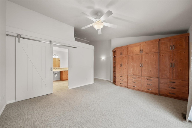 858 S Shelley Lake Ln, Spokane Valley, WA 99037 - unfurnished bedroom featuring light colored carpet, baseboards, and connected bathroom