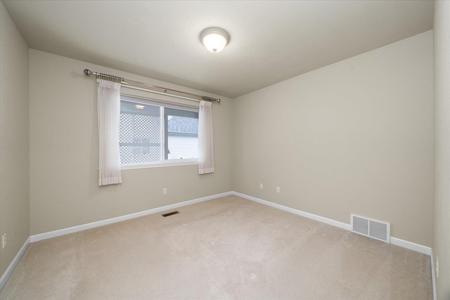 858 S Shelley Lake Ln, Spokane Valley, WA 99037 - carpeted spare room featuring baseboards