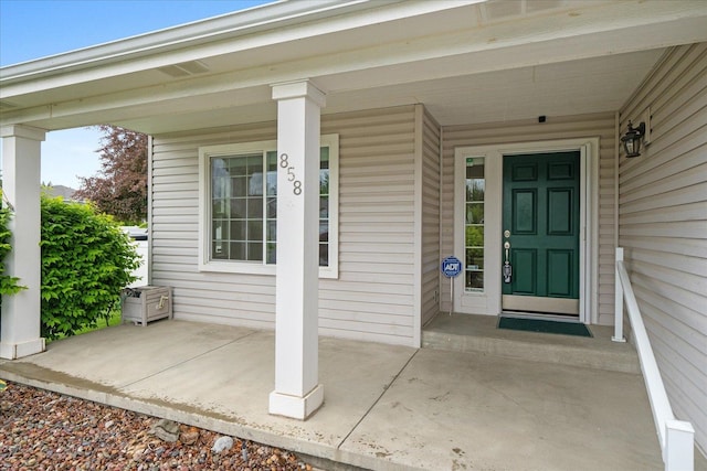 858 S Shelley Lake Ln, Spokane Valley, WA 99037 - doorway to property featuring covered porch
