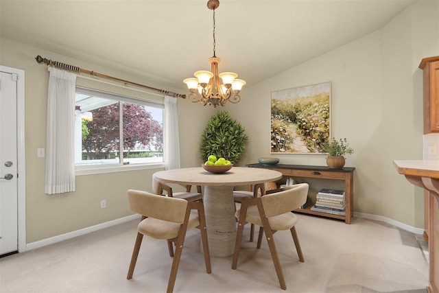 858 S Shelley Lake Ln, Spokane Valley, WA 99037 - dining area with a chandelier, light carpet, baseboards, and vaulted ceiling