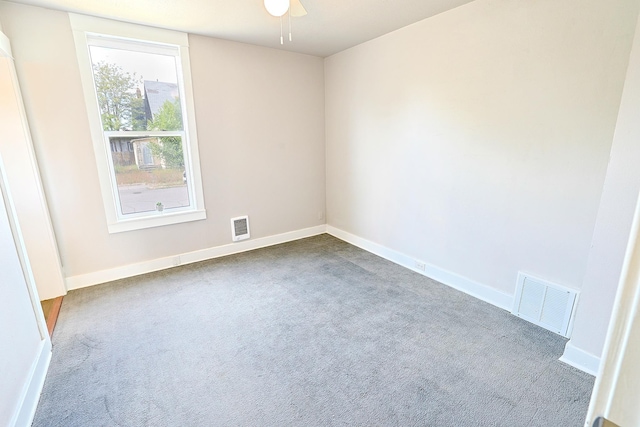 1327 N Howard St, Spokane, WA 99201 - carpeted empty room with ceiling fan and baseboards