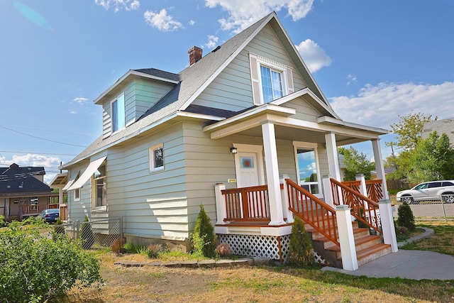 1327 N Howard St, Spokane, WA 99201 - bungalow with a chimney and covered porch