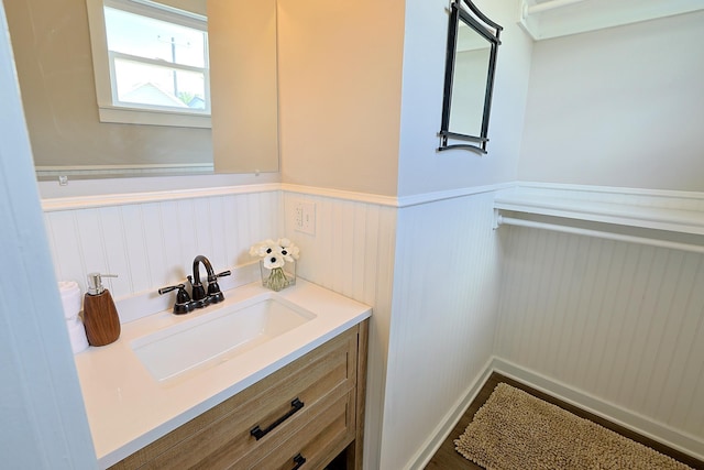 1327 N Howard St, Spokane, WA 99201 - bathroom featuring a wainscoted wall and vanity
