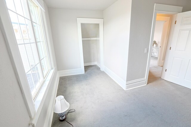 1327 N Howard St, Spokane, WA 99201 - unfurnished bedroom featuring carpet, baseboards, and a closet