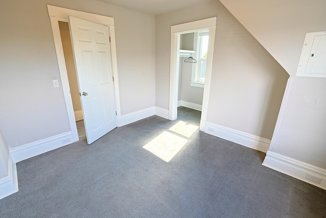 1327 N Howard St, Spokane, WA 99201 - additional living space with electric panel, dark carpet, and baseboards