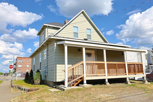 1327 N Howard St, Spokane, WA 99201 - view of front of property featuring a porch