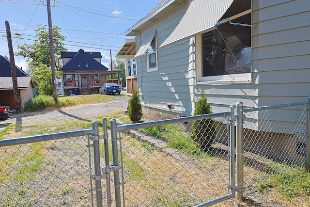 1327 N Howard St, Spokane, WA 99201 - view of property exterior with a gate
