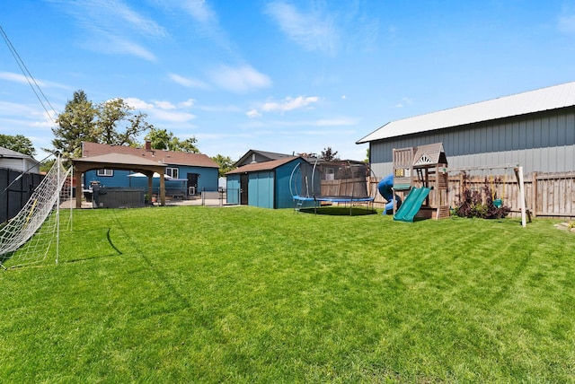 2924 N Smith St, Spokane, WA 99207 - view of yard with a playground, a trampoline, and a gazebo