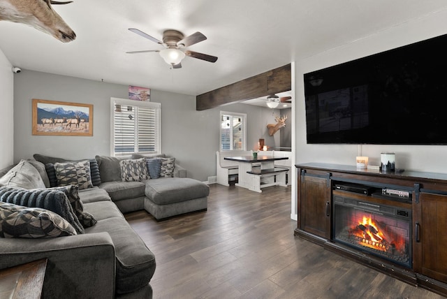2924 N Smith St, Spokane, WA 99207 - living area featuring ceiling fan, dark wood-style floors, and a lit fireplace