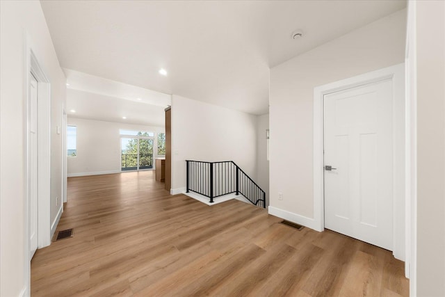 4229 W Tolliver Ct, Spokane, WA 99208 - spare room featuring light wood-type flooring, baseboards, recessed lighting, and a smoke detector