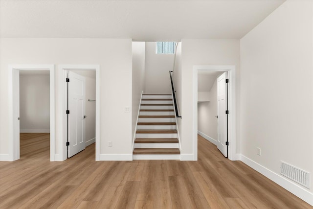 4229 W Tolliver Ct, Spokane, WA 99208 - stairway featuring wood finished floors and baseboards