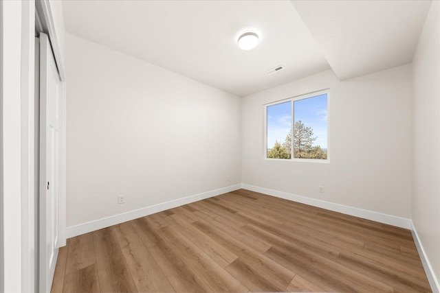4229 W Tolliver Ct, Spokane, WA 99208 - unfurnished bedroom with baseboards and light wood finished floors