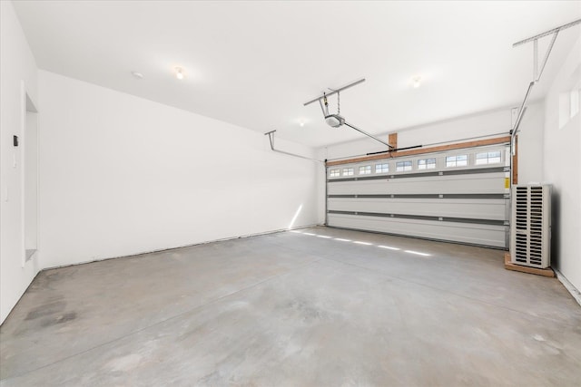 4229 W Tolliver Ct, Spokane, WA 99208 - garage featuring a garage door opener