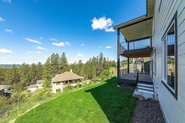 4229 W Tolliver Ct, Spokane, WA 99208 - view of green lawn with a balcony and a deck
