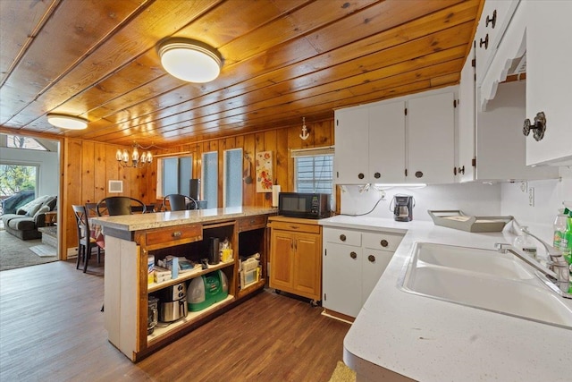 12931 N N Park St, Newman Lake, WA 99006 - kitchen with wood ceiling, black microwave, a peninsula, light countertops, and open shelves