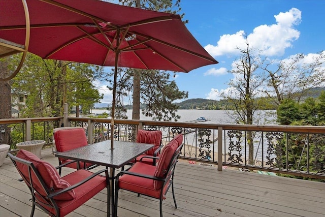 12931 N N Park St, Newman Lake, WA 99006 - wooden deck featuring a water view and outdoor dining area