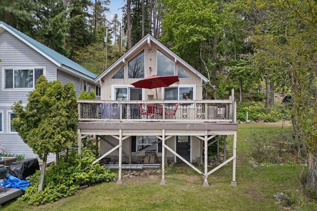 12931 N N Park St, Newman Lake, WA 99006 - back of property featuring a deck, a yard, and view of scattered trees