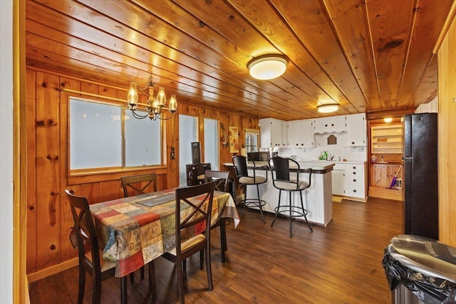 12931 N N Park St, Newman Lake, WA 99006 - dining room with wood ceiling, a chandelier, dark wood finished floors, and wooden walls