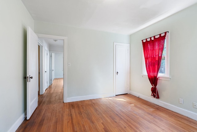 106 E 29th Avenue Corner Of 29Th & Tekoa - Entry & Garage On Tekoa, Spokane, WA 99203 - spare room featuring wood finished floors and baseboards