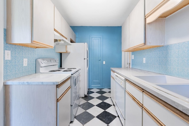 106 E 29th Avenue Corner Of 29Th & Tekoa - Entry & Garage On Tekoa, Spokane, WA 99203 - kitchen with white appliances, under cabinet range hood, light floors, light countertops, and tasteful backsplash