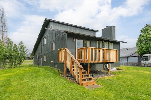 20716 E Gilbert Rd, Otis Orchards, WA 99027 - rear view of property with a wooden deck and a chimney