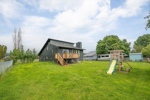 20716 E Gilbert Rd, Otis Orchards, WA 99027 - rear view of house with stairway, a playground, and a wooden deck