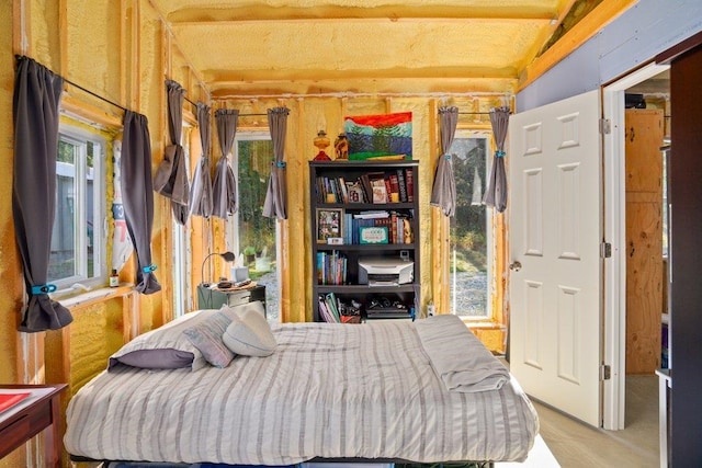300 Duck Ln, Newport, WA 99156 - bedroom featuring beamed ceiling and wooden walls