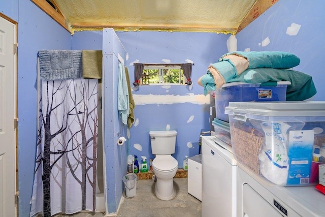 300 Duck Ln, Newport, WA 99156 - bathroom with toilet, unfinished concrete flooring, and a shower with curtain