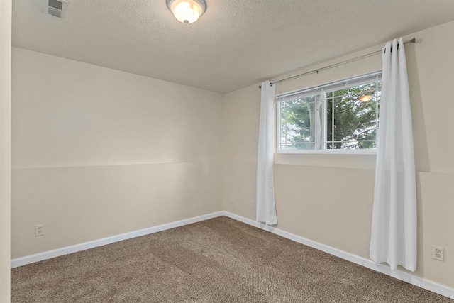 4022 E 25th Ave, Spokane, WA 99223 - unfurnished room with carpet floors, a textured ceiling, and baseboards