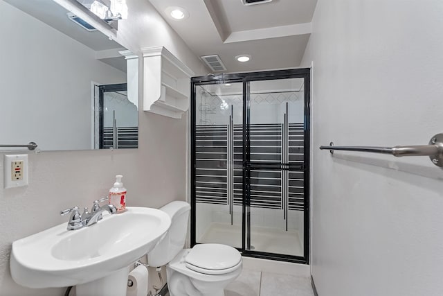 4022 E 25th Ave, Spokane, WA 99223 - bathroom featuring toilet, a sink, a shower stall, recessed lighting, and tile patterned floors