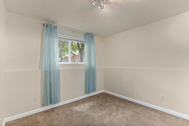 4022 E 25th Ave, Spokane, WA 99223 - unfurnished room with carpet flooring, a textured ceiling, and baseboards