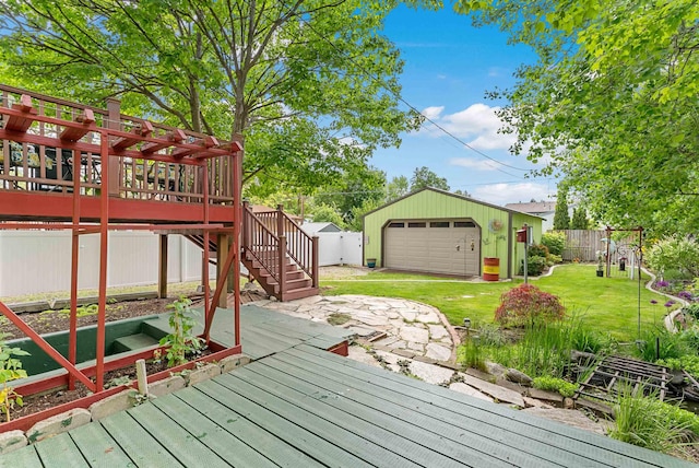 4022 E 25th Ave, Spokane, WA 99223 - deck with a detached garage, an outdoor structure, and stairs