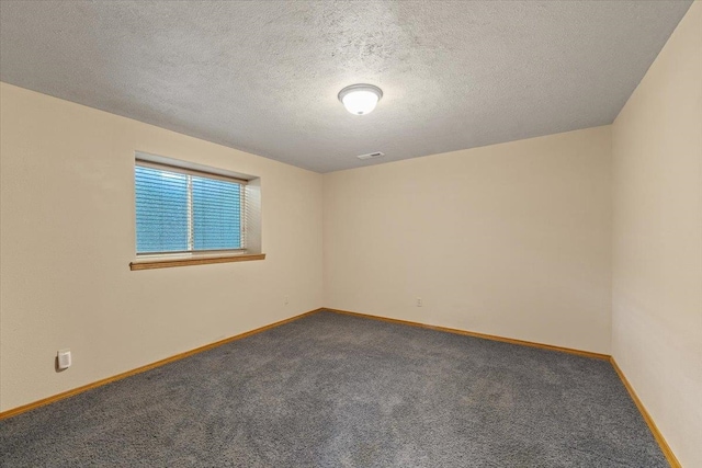 12914 E 36th Ave, Spokane Valley, WA 99206 - carpeted empty room with baseboards and a textured ceiling