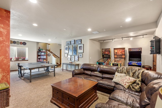 1467 E Lacey Ave, Hayden, ID 83835 - living area with stairway, light carpet, rail lighting, and recessed lighting
