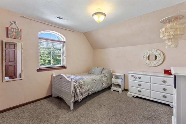 1467 E Lacey Ave, Hayden, ID 83835 - bedroom with carpet, vaulted ceiling, and baseboards