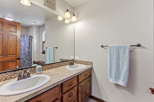 1467 E Lacey Ave, Hayden, ID 83835 - bathroom featuring double vanity