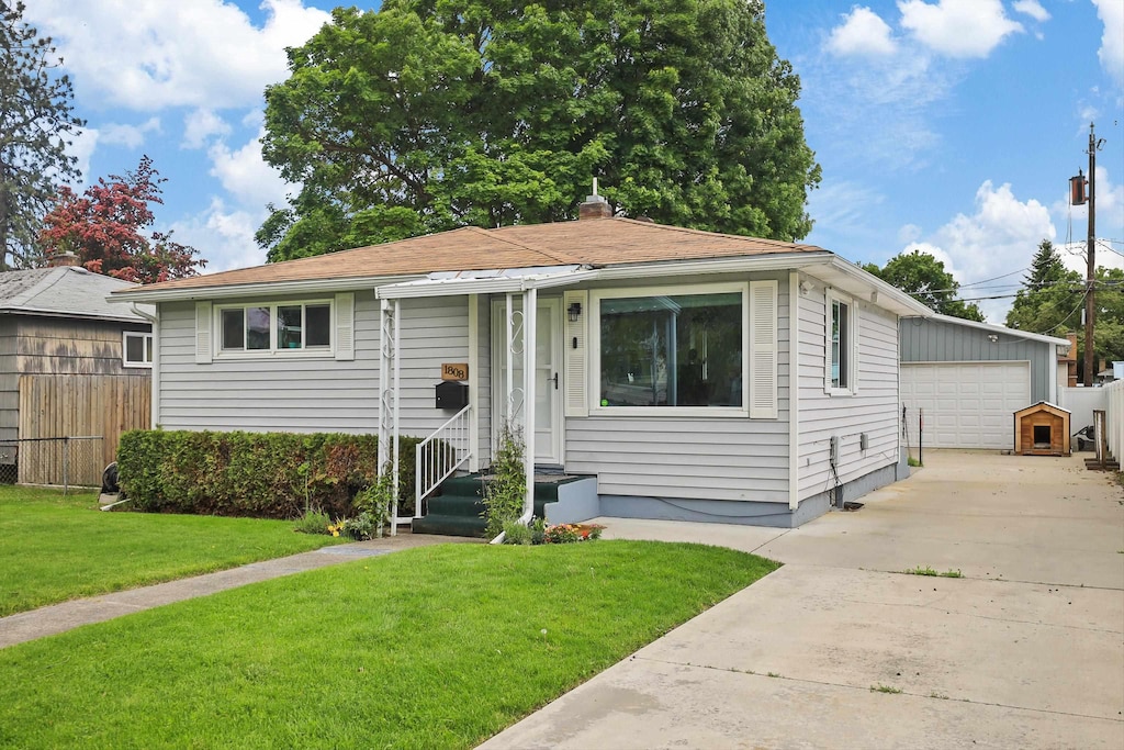 1808 E Decatur Ave, Spokane, WA 99208 - view of front facade featuring an outbuilding and a detached garage