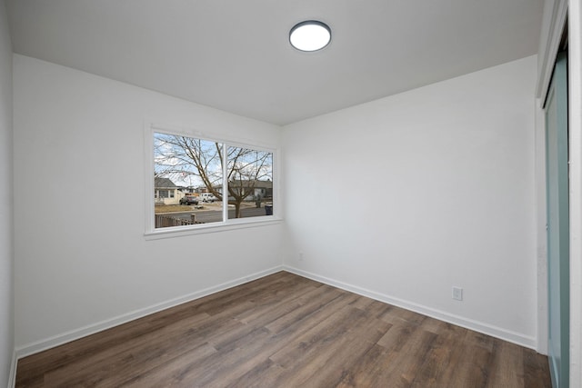 614 S Lawson St, Airway Heights, WA 99001 - unfurnished room with dark wood-style flooring and baseboards