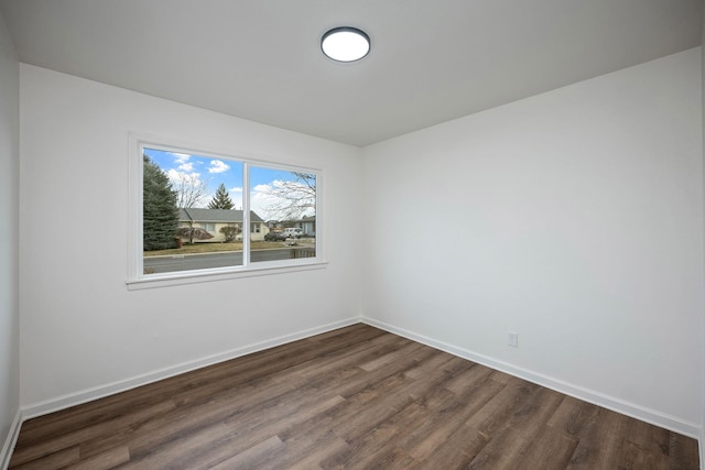 614 S Lawson St, Airway Heights, WA 99001 - unfurnished room with dark wood finished floors and baseboards