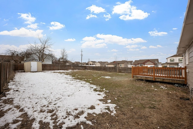 614 S Lawson St, Airway Heights, WA 99001 - snowy yard featuring a fenced backyard and a residential view