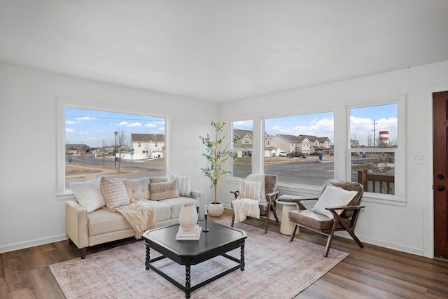 614 S Lawson St, Airway Heights, WA 99001 - living room with plenty of natural light, wood finished floors, and baseboards