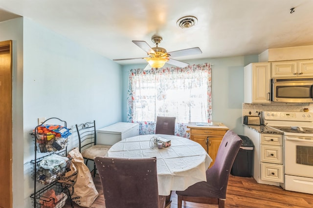 4004 W Taft Dr, Spokane, WA 99208 - dining area with dark wood-style floors and a ceiling fan