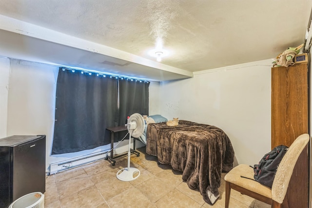 4004 W Taft Dr, Spokane, WA 99208 - tiled bedroom featuring a textured ceiling